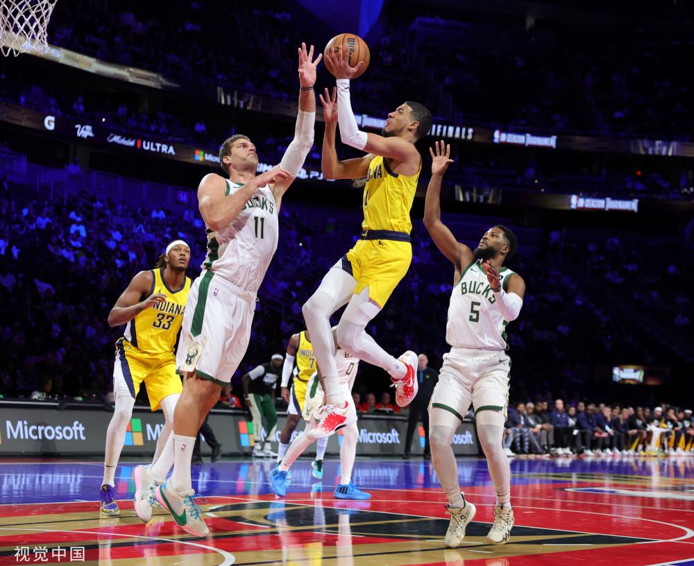 与其说他是 与其说他是